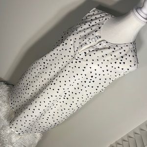 White V-neck blouse with black tiny hearts